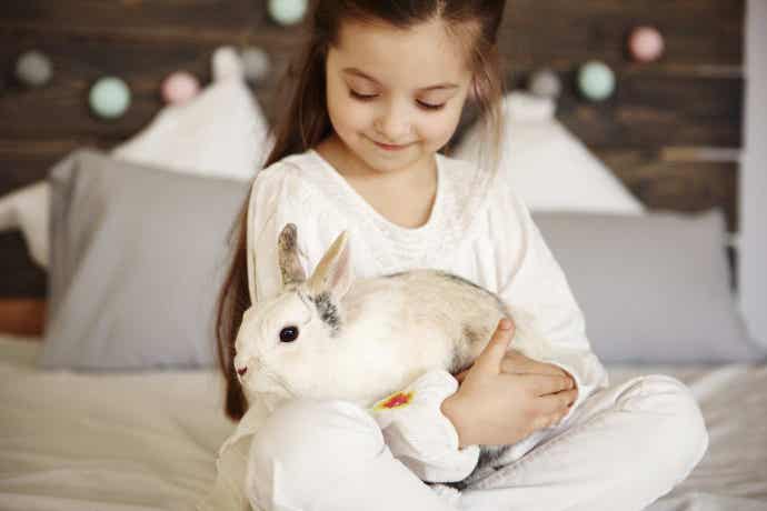 Girl holding a bunny
