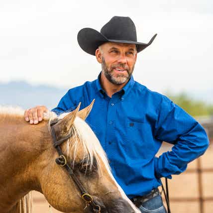 Craig Schmersal petting horse