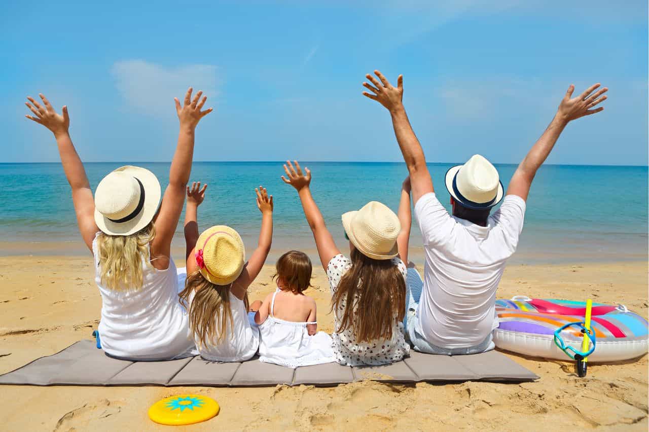 Family celebrating on the beach