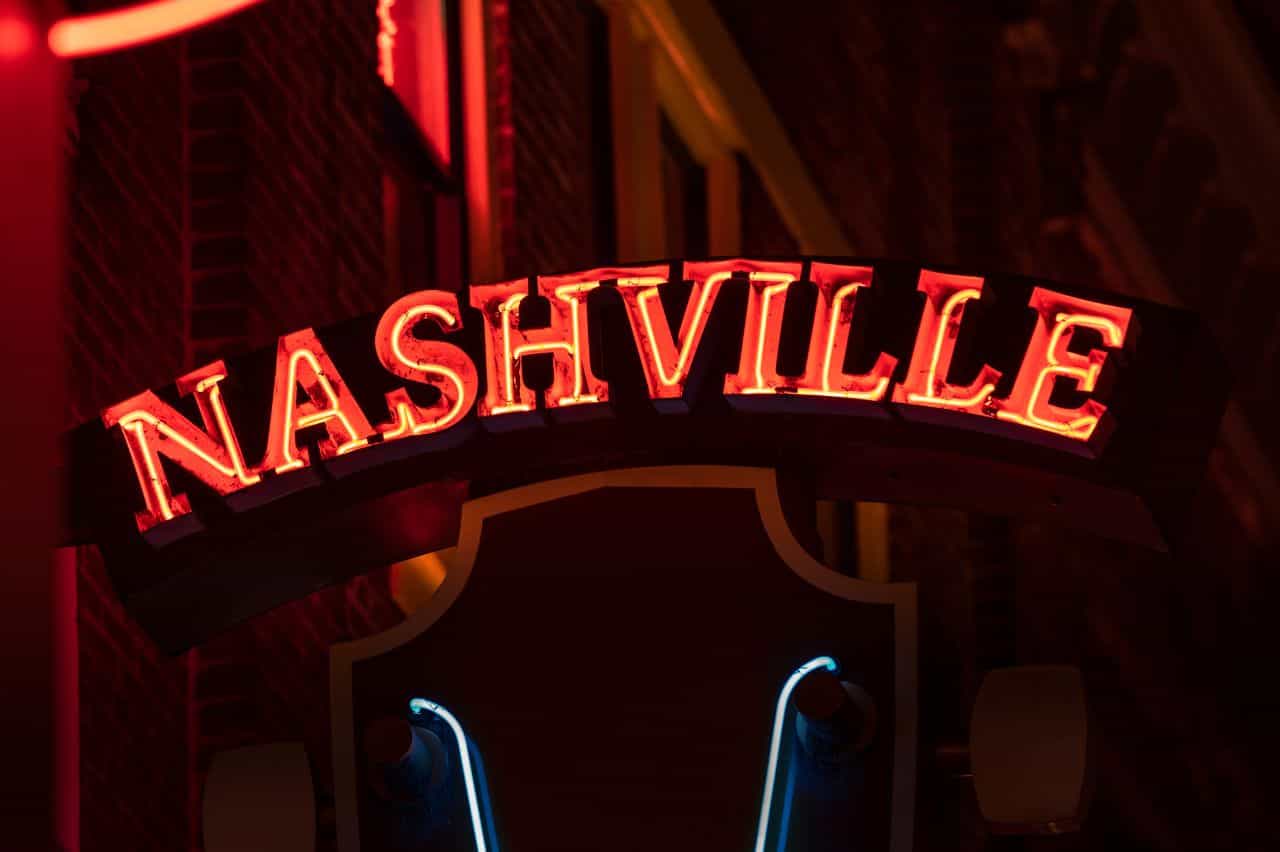 Neon sign spelling Nashville in red letters