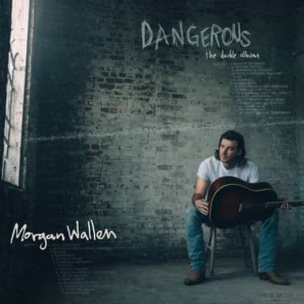 Album cover: Morgan Wallen with guitar in empty room