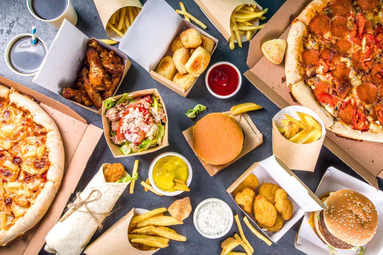 Assortment of burgers, wings, and french fries